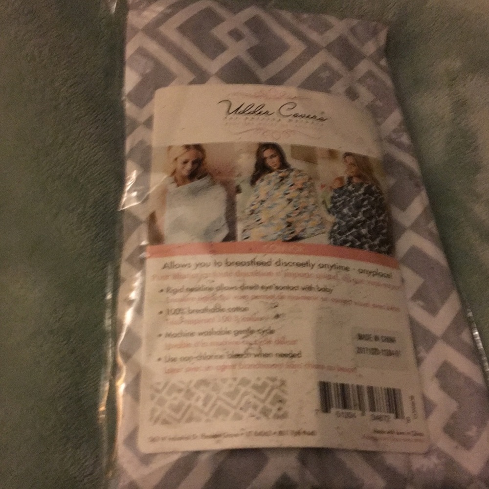 Breast feeding cover by Udder Covers.